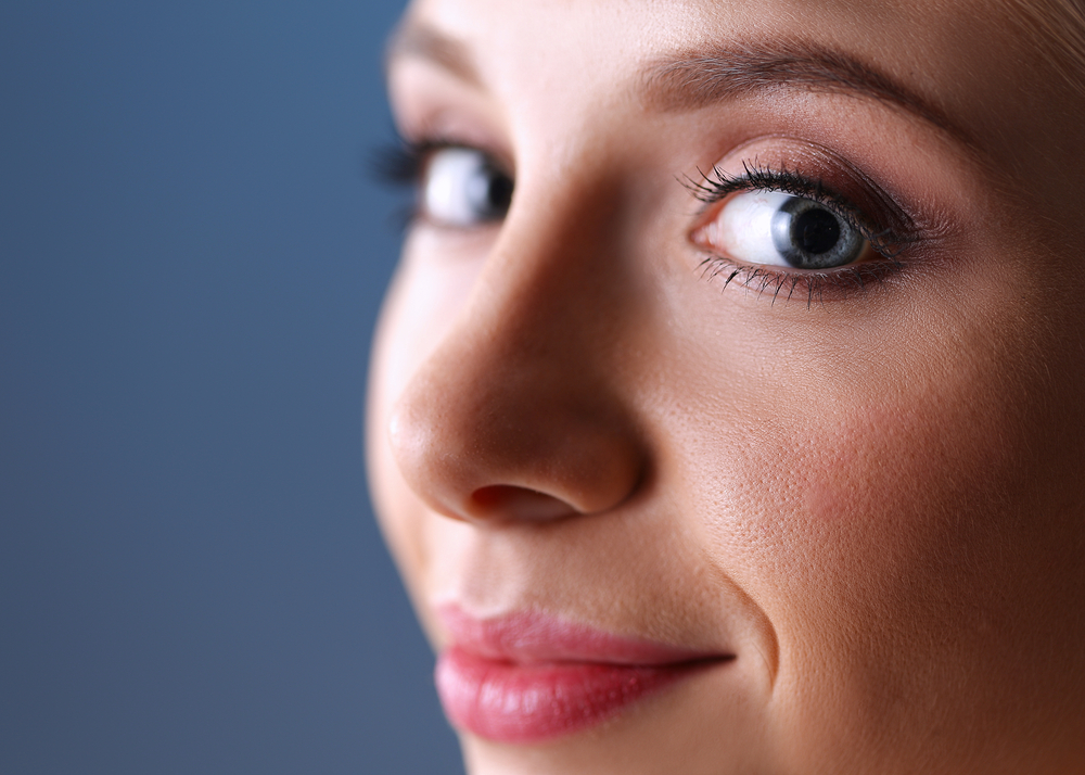 A,Beautiful,Woman,,Portrait,Isolated,On,Blue,Background